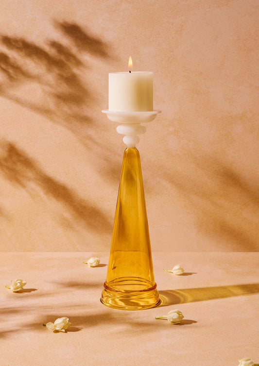 Yellow Kanak candle stand with white pillar styled for Diwali – Glass-Forest